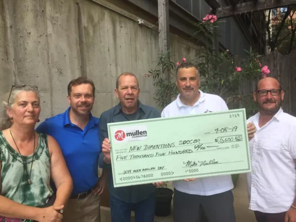 Mike Mullen Foundation presents New Dimensions Soccer with a generous donation!